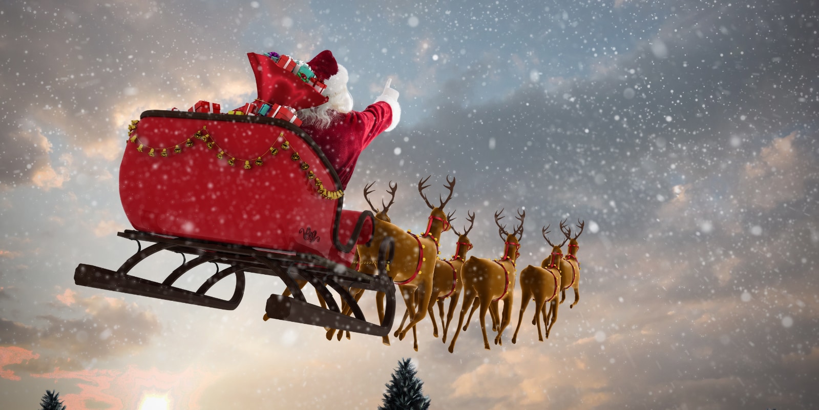 Composite Image Of Santa Claus Riding On Sleigh With Gift Box